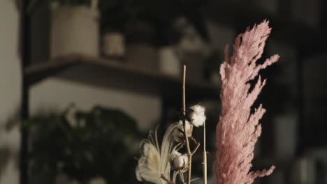 florist shop, cinematic closeup of flower arrangement in vase.