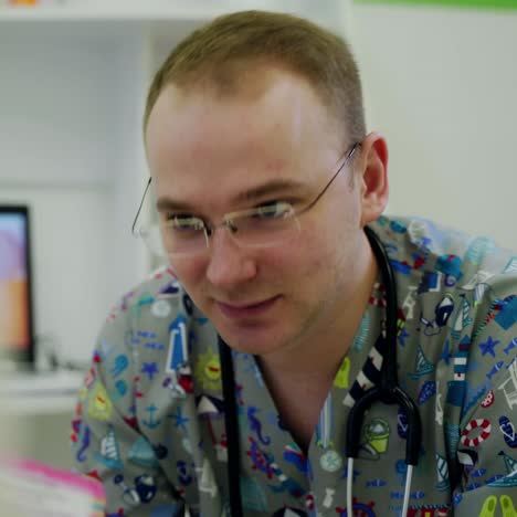 doctor explaining children healthcare. kid doctor examing little child in hospital