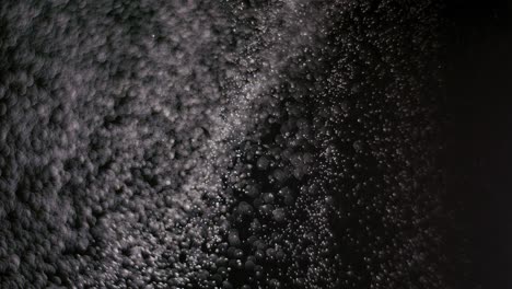 powder isolated on black background