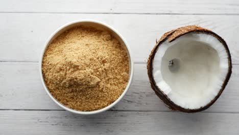 Coconut-sugar-in-a-white-bowl-on-table-,