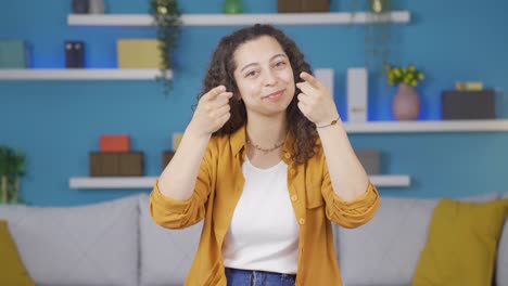 Young-woman-showing-mind-to-camera.