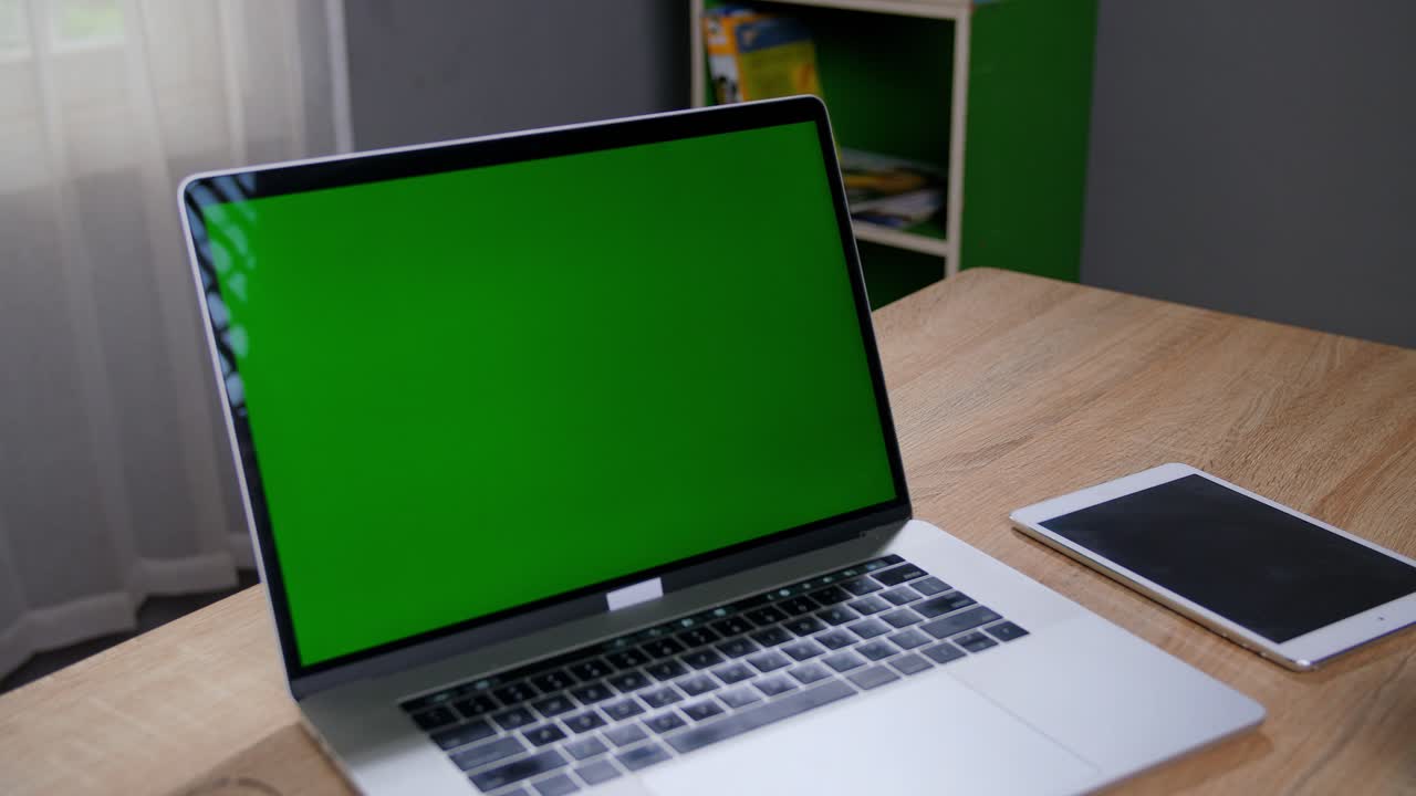 Laptop and tablet on a table