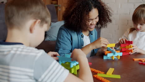 children playing with building blocks
