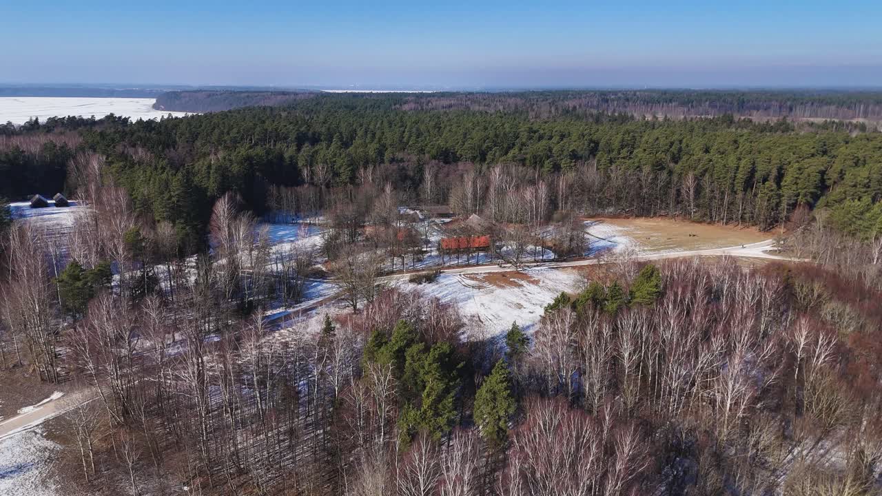 Small village in forest on winter season, aerial view
