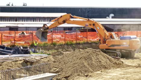 Excavator-moving-construction-machinery-for-housing-project