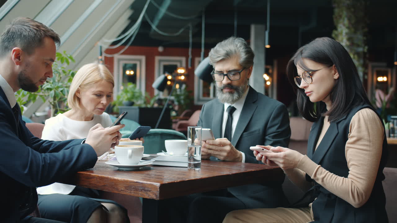 Business Team Meeting in a Cafe