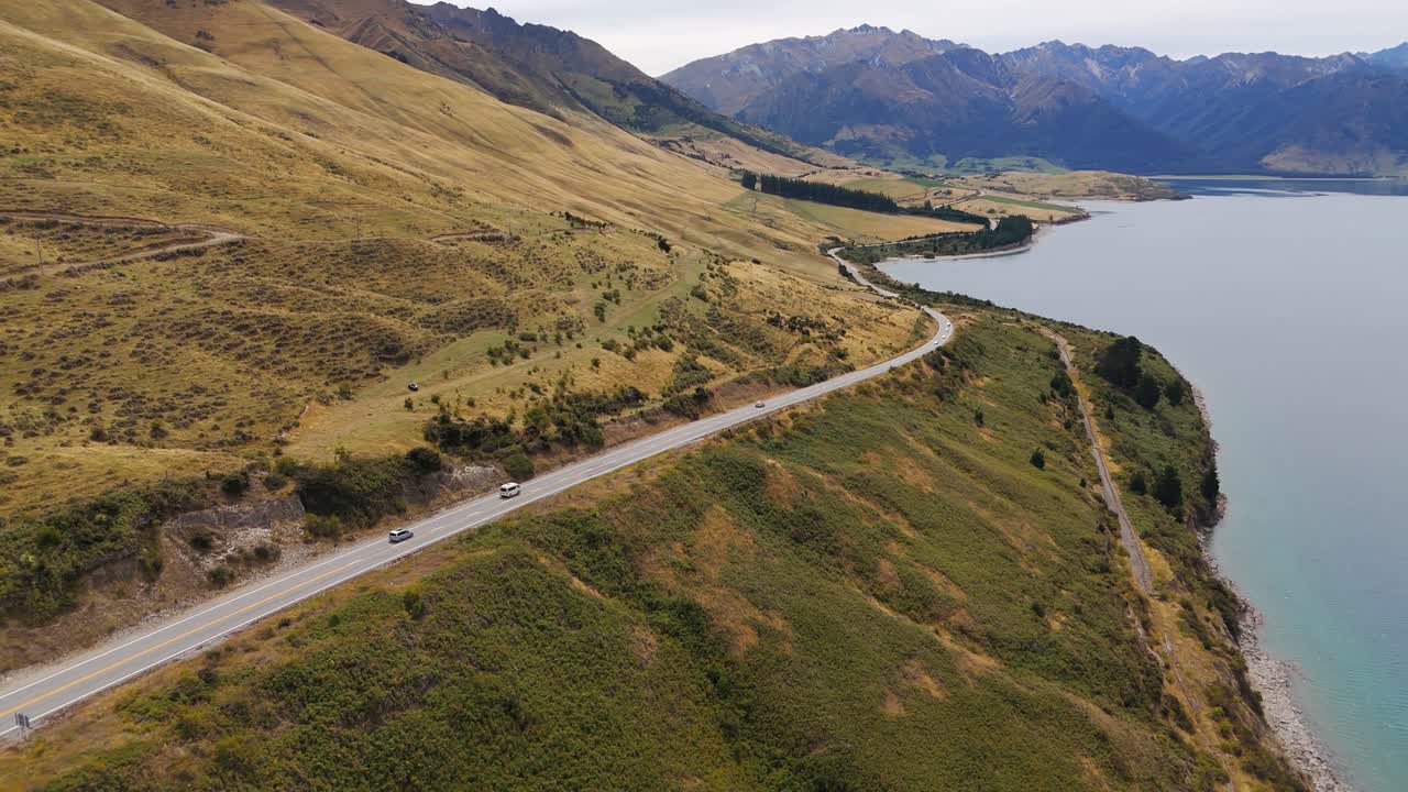 Scenic Road Trip Along a Turquoise Lake in New Zealand