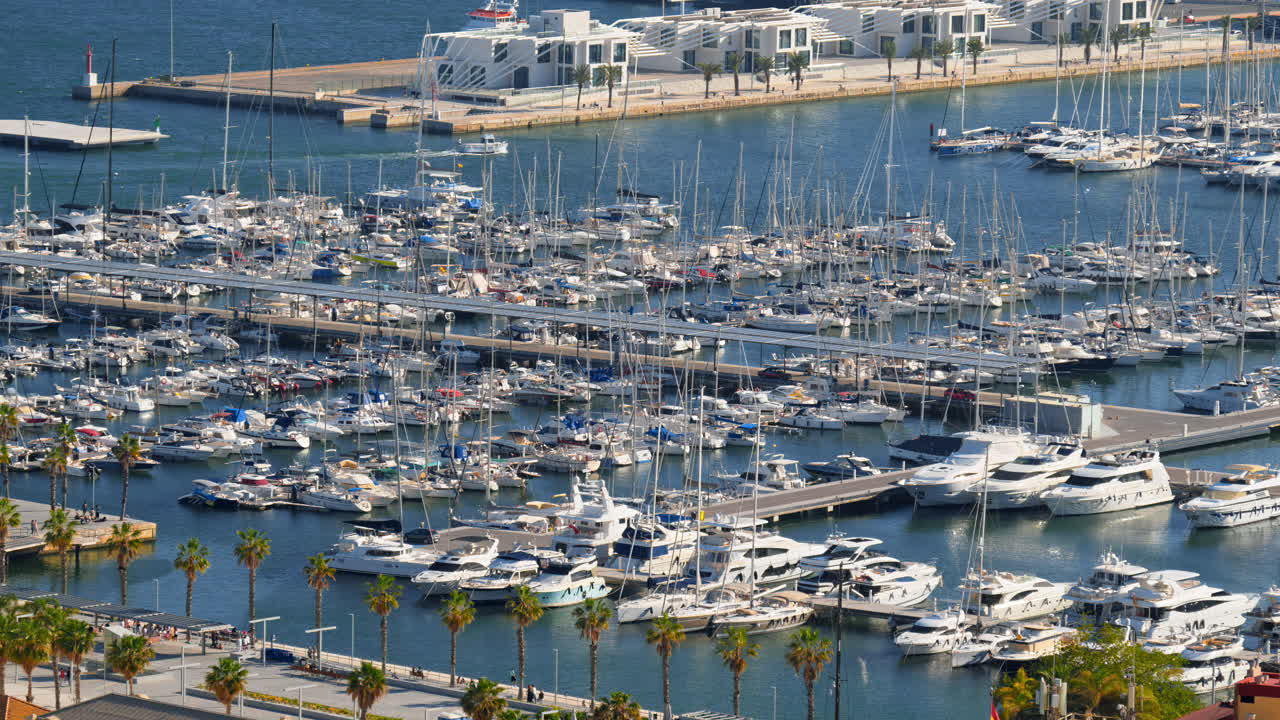 Aerial view of boats docked in the Alicante marina in the daylight in Spain