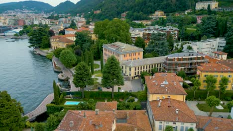 4k aerial drone video of the beautiful lakeside gardens of villas on lake como, italy in the summer