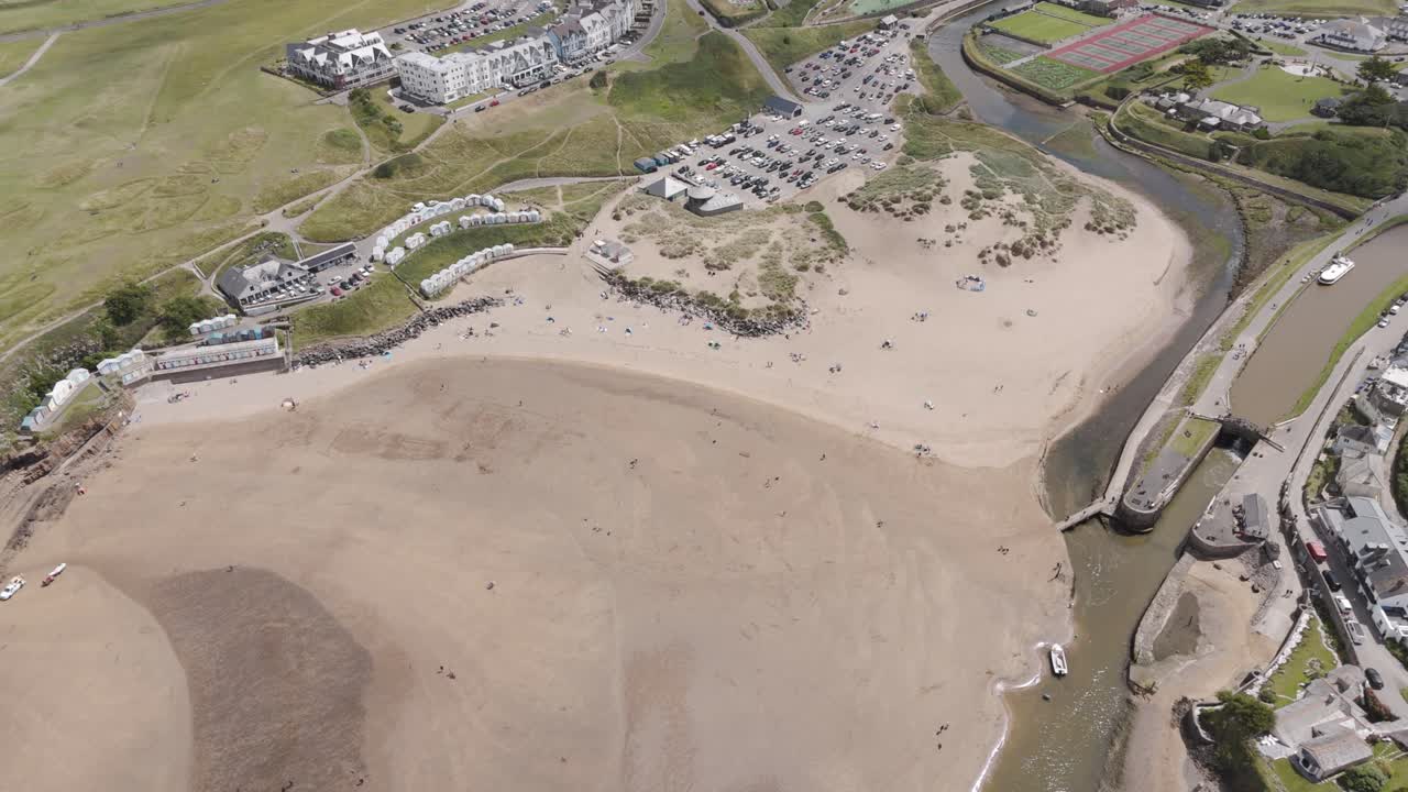 Aerial View of a Coastal Town and Beach with River Estuary