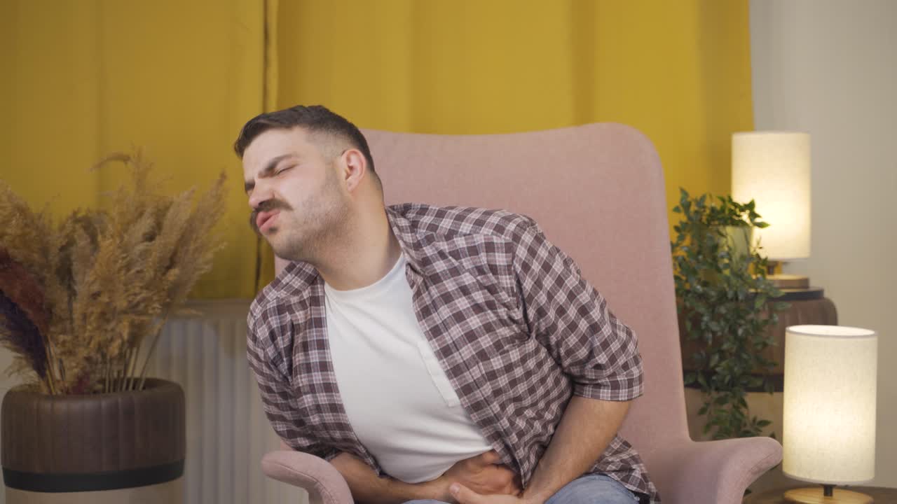 Man with stomachache.