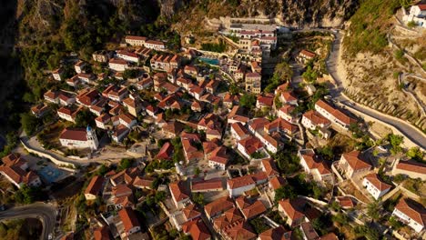 dhermi's ancient town in albania, nestled in mountains with terracotta rooftops and winding roads