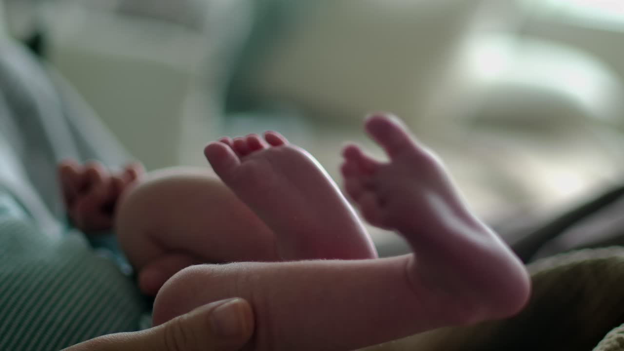 Newborn Baby's Legs and Feet Close Up Slow Motion