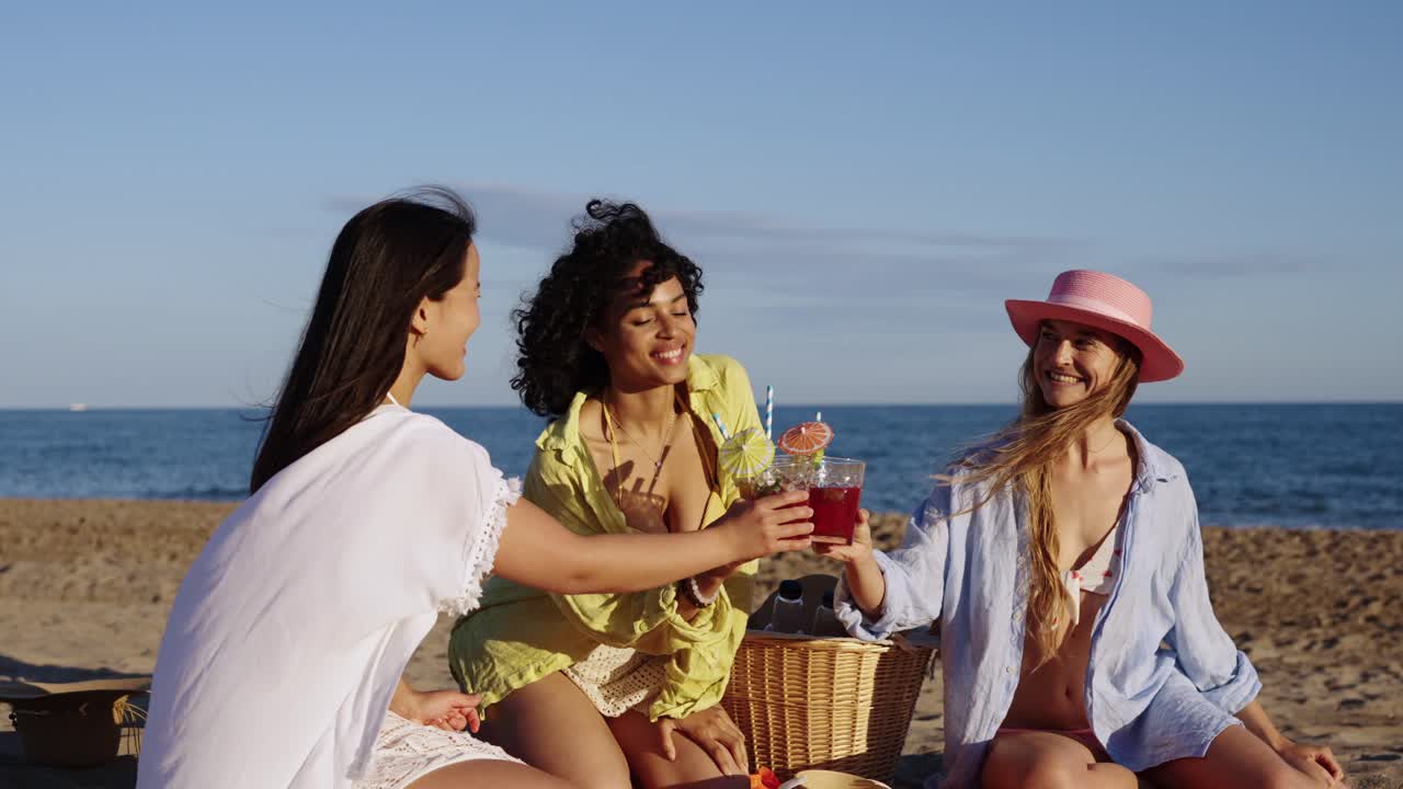 Friends enjoying a picnic on the beach