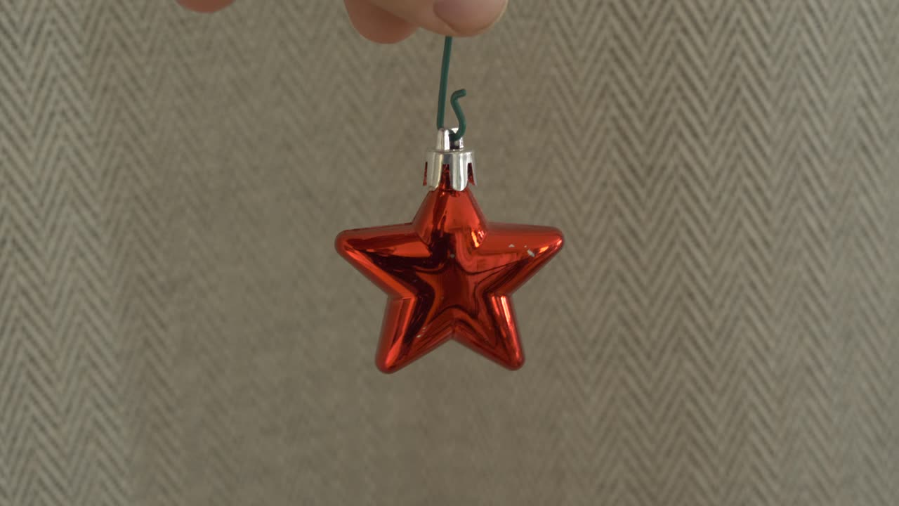 red swinging star for christmas decorations