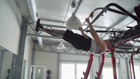 Disabled man with prosthetic leg with incredible upper body strength