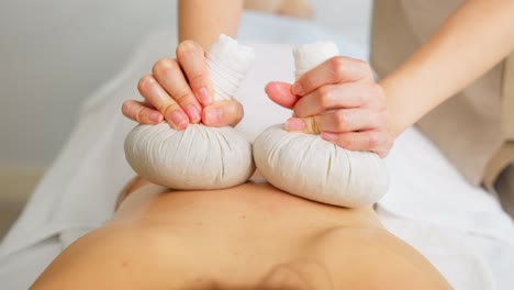 thai herbal compress massage