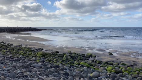 Cicer rock beach in Las Palmas city on cloudy day