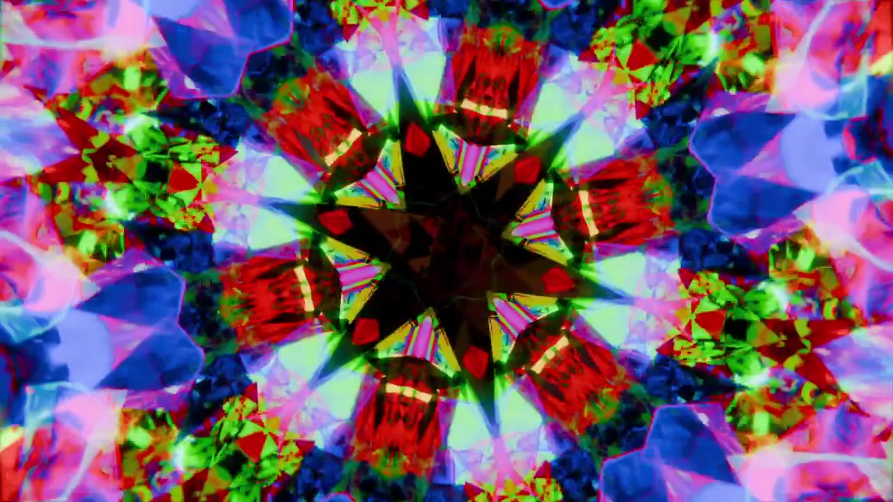 Mandala centrato rotante all'inizio, che forma una stella e frammenti esagonali specchiati per un effetto visivo