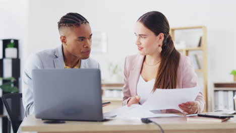 Laptop,-documents-and-business-people