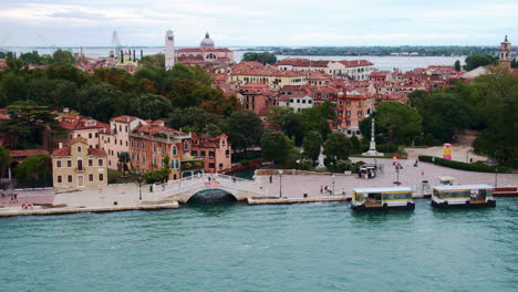 Aerial-shot-of-Castello,-Vence,-Italy-shoreline-at-sunset,-including-Giardini