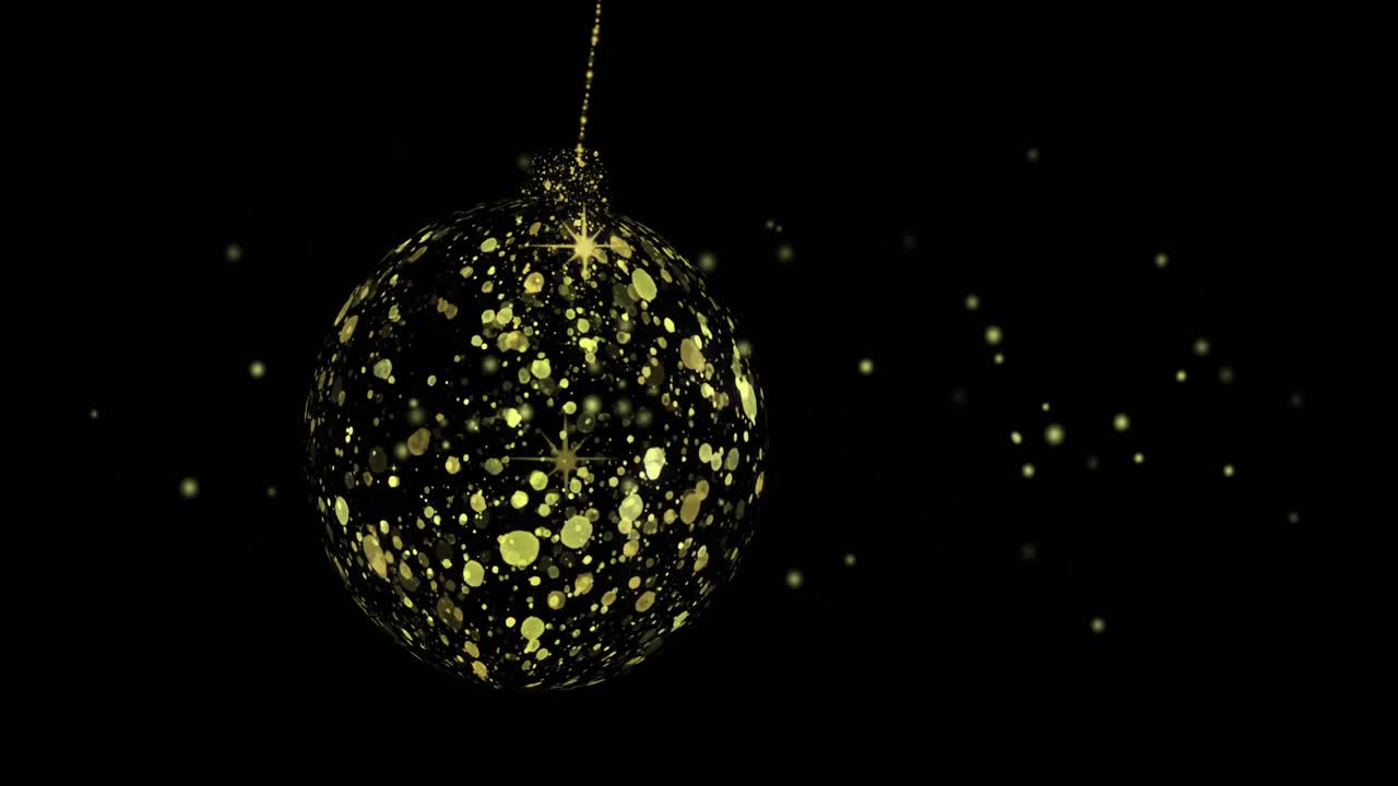 Animation af prikker over en gylden julekugle på sort baggrund