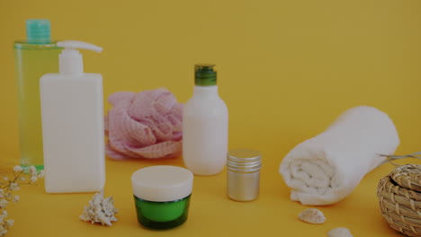 spa products and accessories on a yellow background