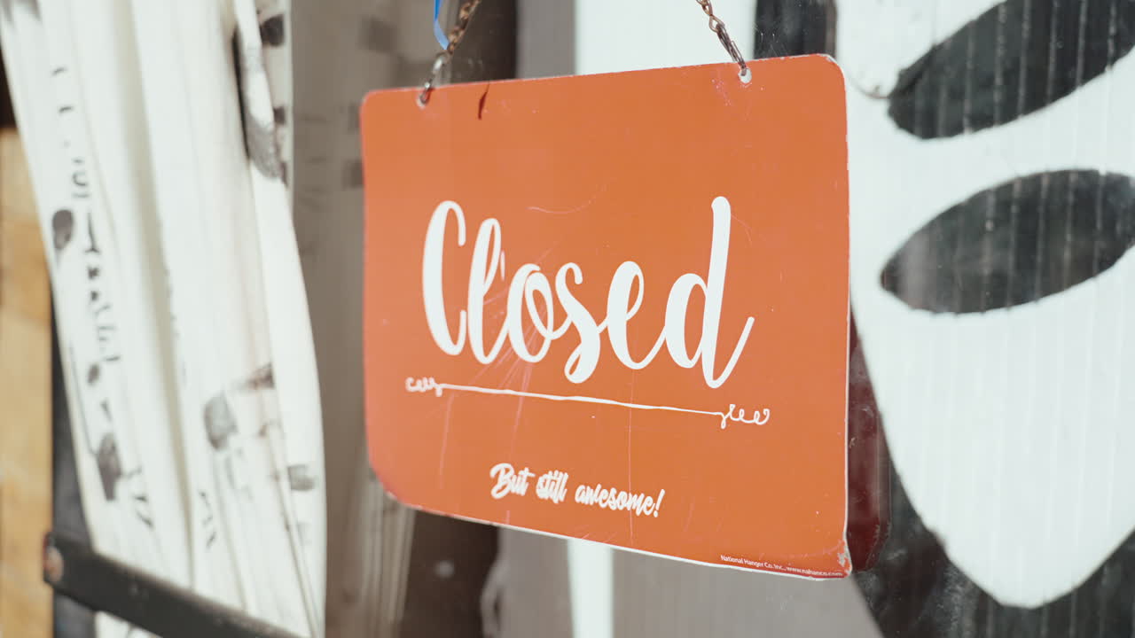 Closed Sign on a Shop Window