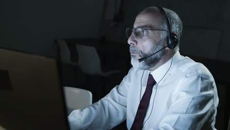 focused male teleworker in headset