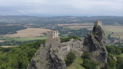 two stone towers above a vast czech countryside,trosky castle on rocks