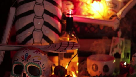 skeleton decorations and offerings and incense on dia de muertos altar