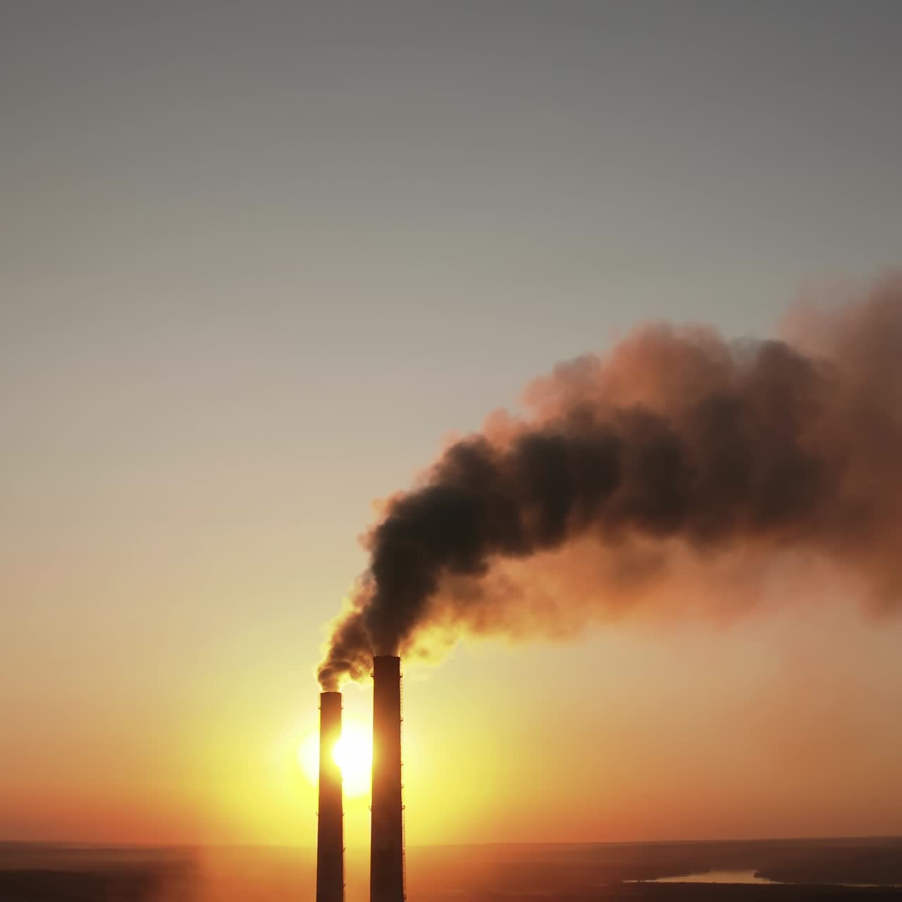 Power pylons on sunset time background. High voltage electric tower at the sunset. Fabric concept. Selective focus