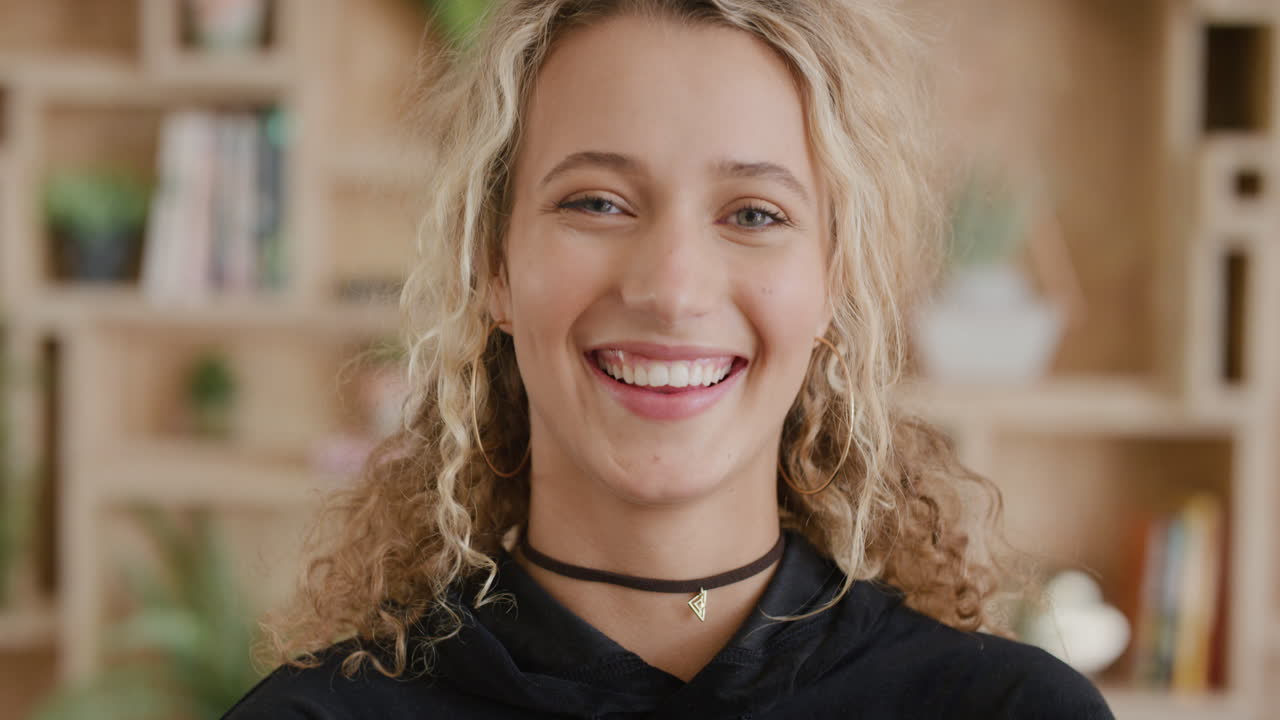 portrait of happy young blonde woman laughing enjoying success cheerful female student satisfaction