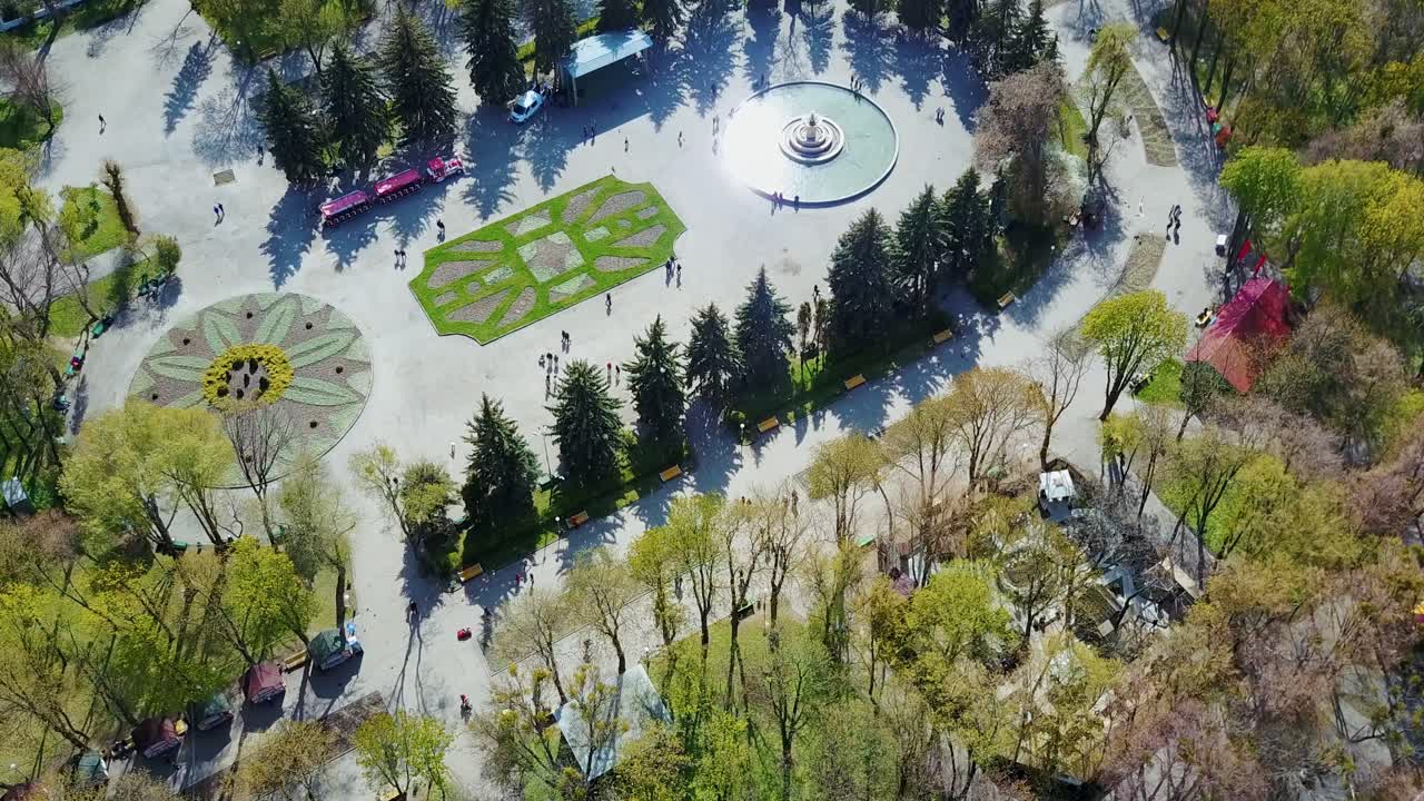 Aerial shot of city park. Aerial drone view of central city park