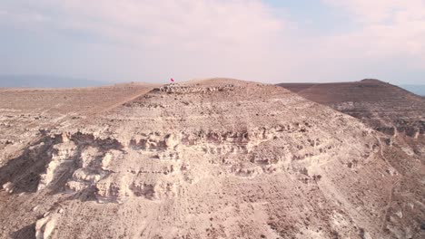 Aerial-Shot-of-Fairy-Chimneys-in-Cappadocia's-Red-Valley-in-Turkey