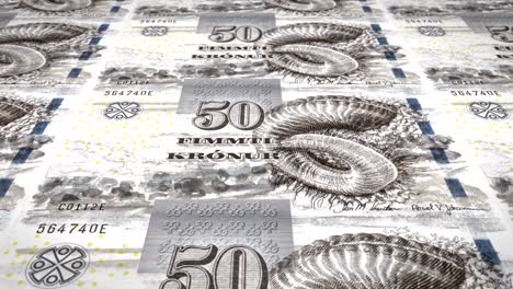 billetes de cincuenta coronas feroeses de las islas feroe que ruedan, dinero en efectivo, bucle
