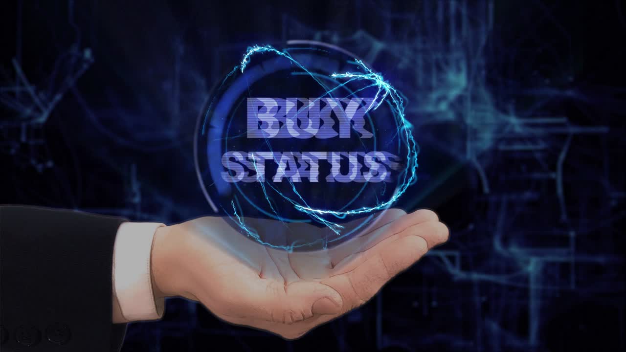 Painted hand shows concept hologram Buy status on his hand