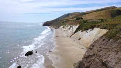 aerial over the beautiful coastline of santa barbara california near gaviota state beach with fishermen below 1