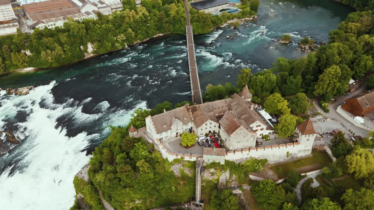 Aerial view of Rhine Falls in Schaffhausen, Switzerland with the castle from the front