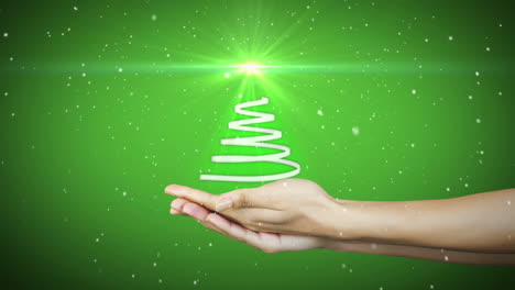 Hand-presenting-christmas-tree-design-