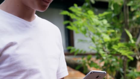 Close-up-of-schoolboy-using-mobile-phone-4k