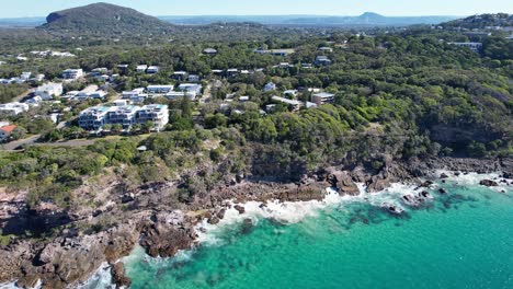 picturesque waterfront houses along jubilee esplanade in point arkwright, qld, australia