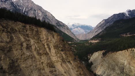 Aerial-drone-shot-flying-through-a-valley-near-Duffey-Lake-in-British-Columbia