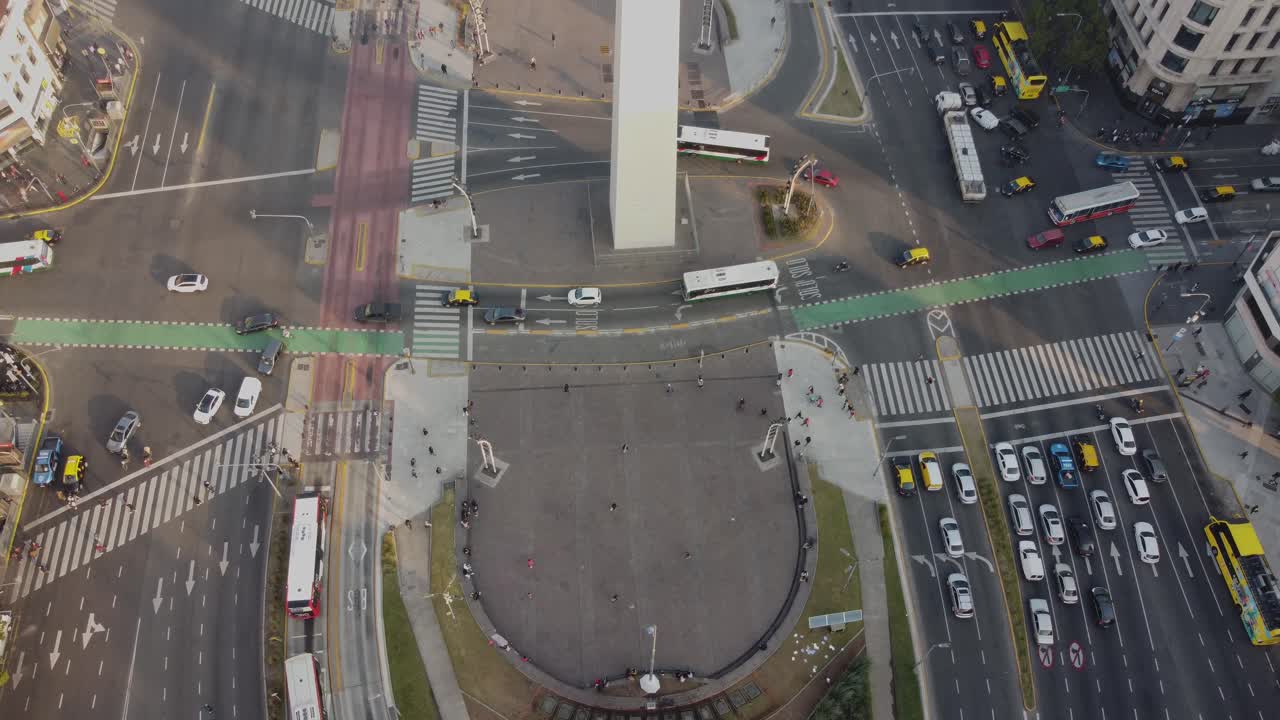 Aerial View of Busy City Intersection with Obelisk and Traffic