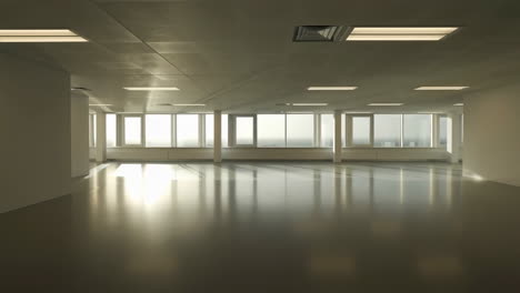 empty modern office space with sunlight and large windows