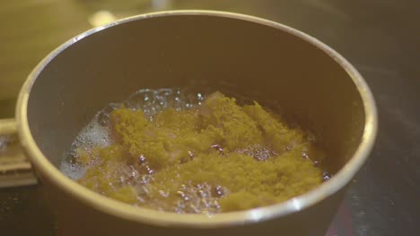 deep-frying food in a pot