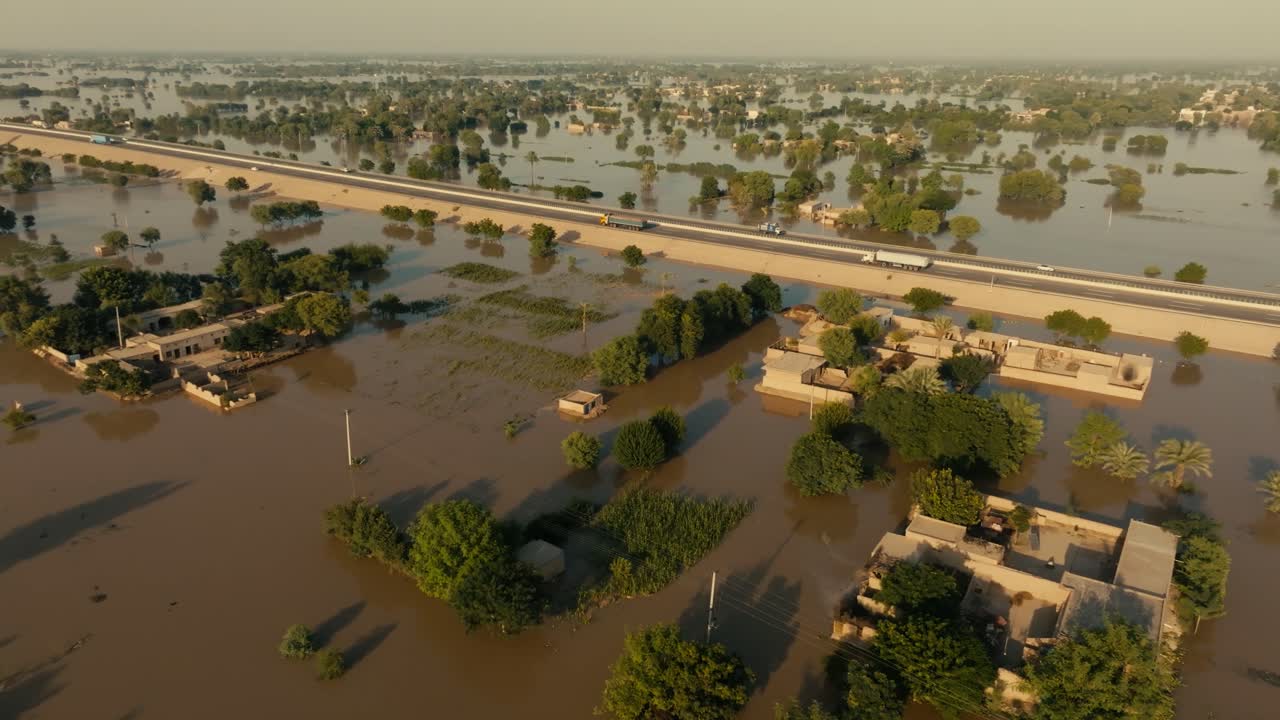 aerial view of submerged buildings and highway in Jalalpur Pirwala Punjab Pakistan