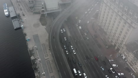 cityscape aerial view with foggy road traffic