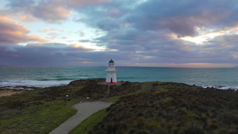 Picturesque-aerial-view-of-Waipapa-Lighthouse-along-the-coast-of-New-Zealand's-South-Island