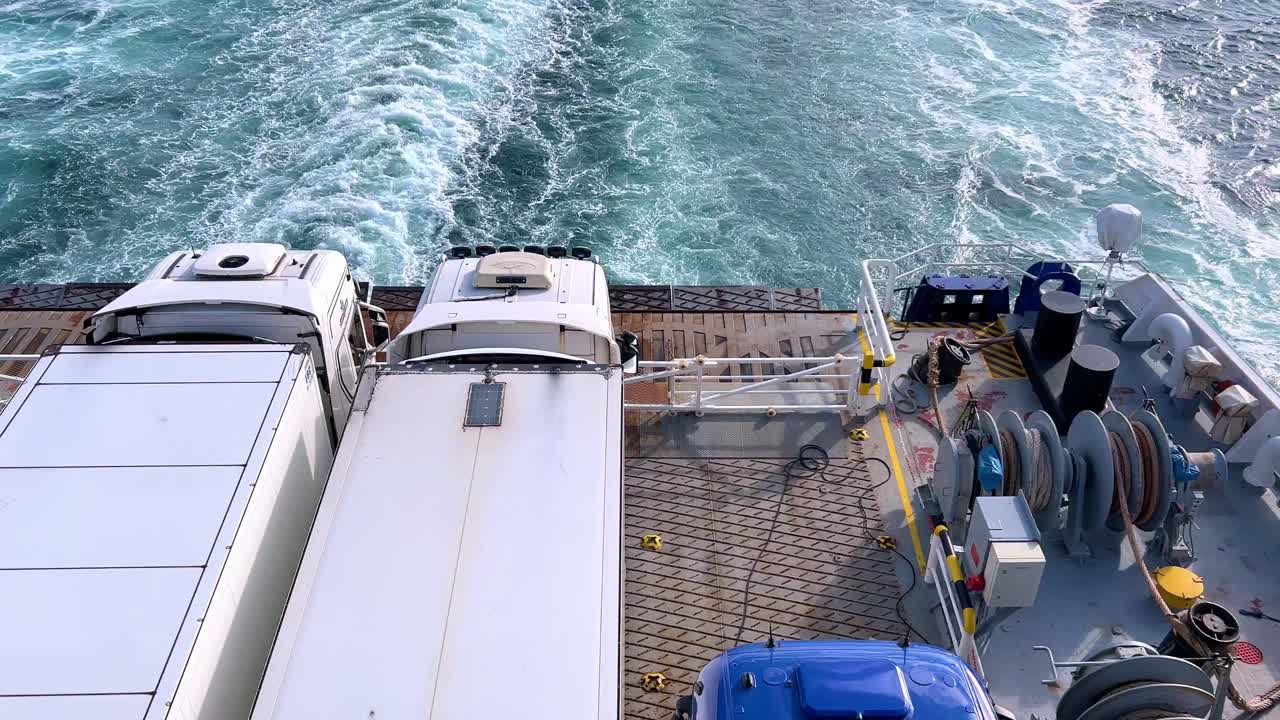 large ship travelling through blue water giving rise to wake in the English Chanel